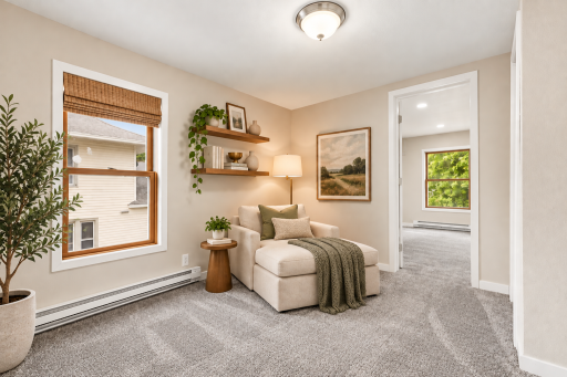 Virtually staged transitional space - many options to use this for an extra quiet reading nook, office or hobby area, or play room
