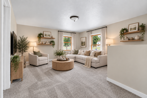 Upper level landing virtually staged with warm lighting, neutral decor, and a cozy sitting area