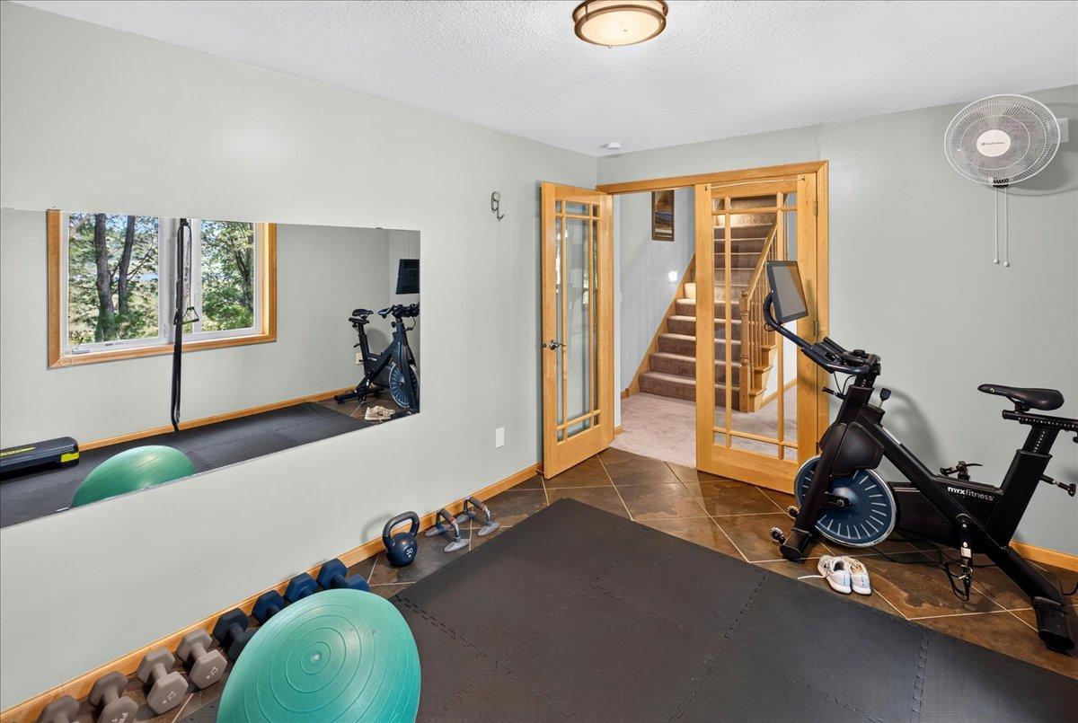 Bedroom, exercise room, office or play space w/ lake view