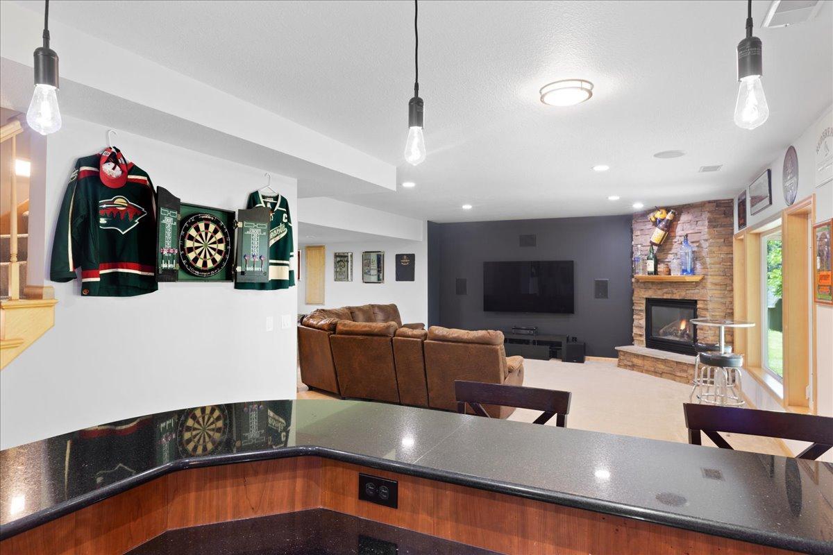Entertain with TV and fireplace view