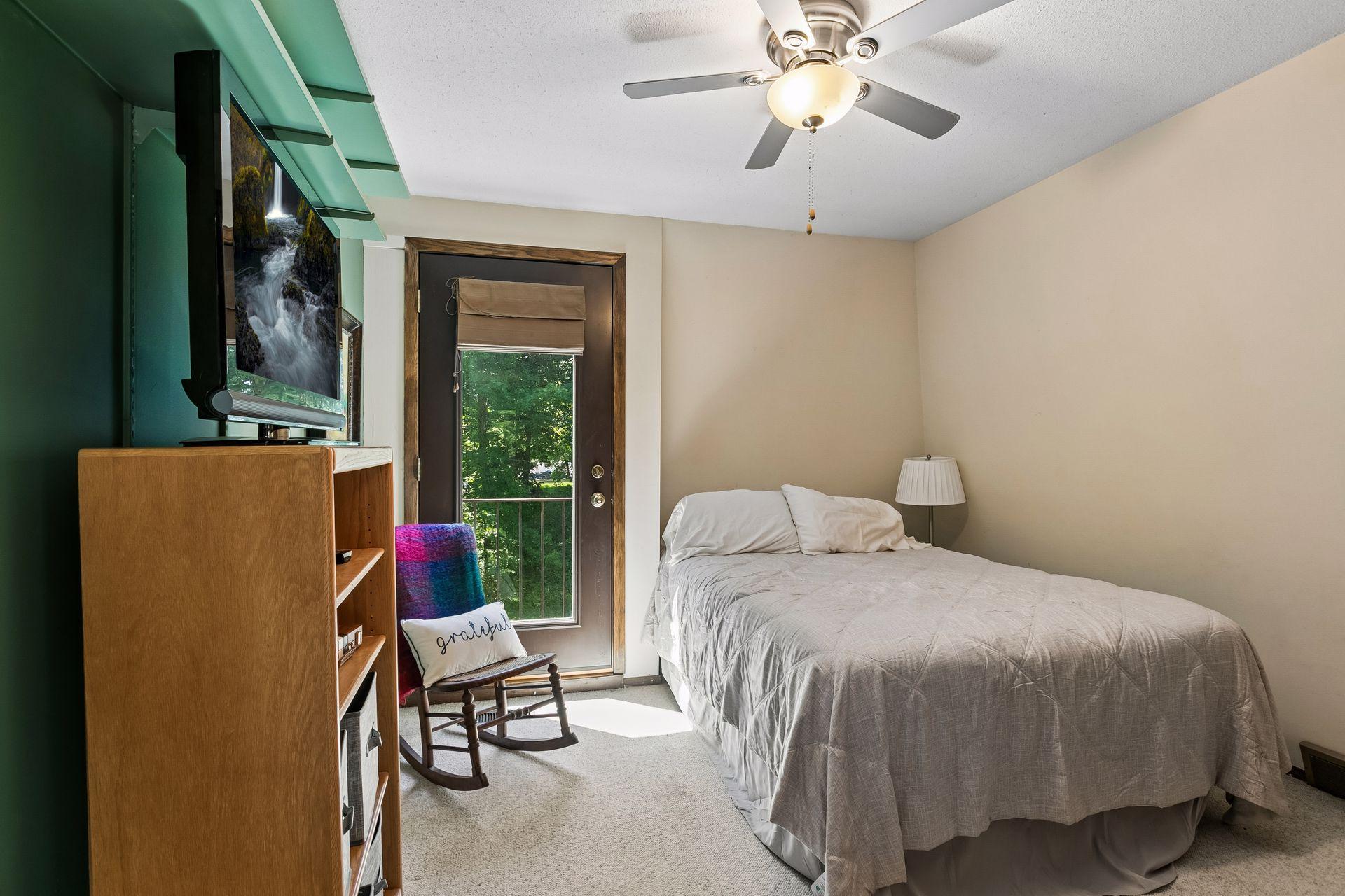 Two additional bedrooms are located on the upper level. Both have Juliet balconies.
