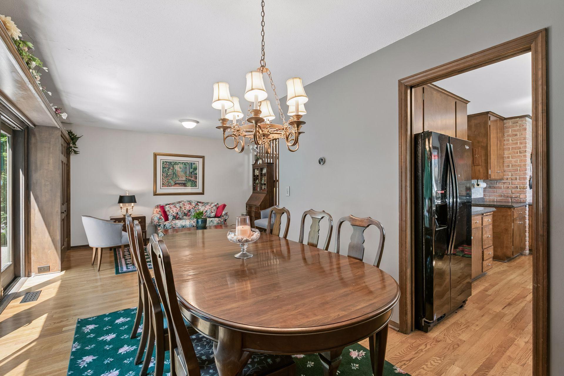 The formal dining room can easily expand to accommodate larger groups.