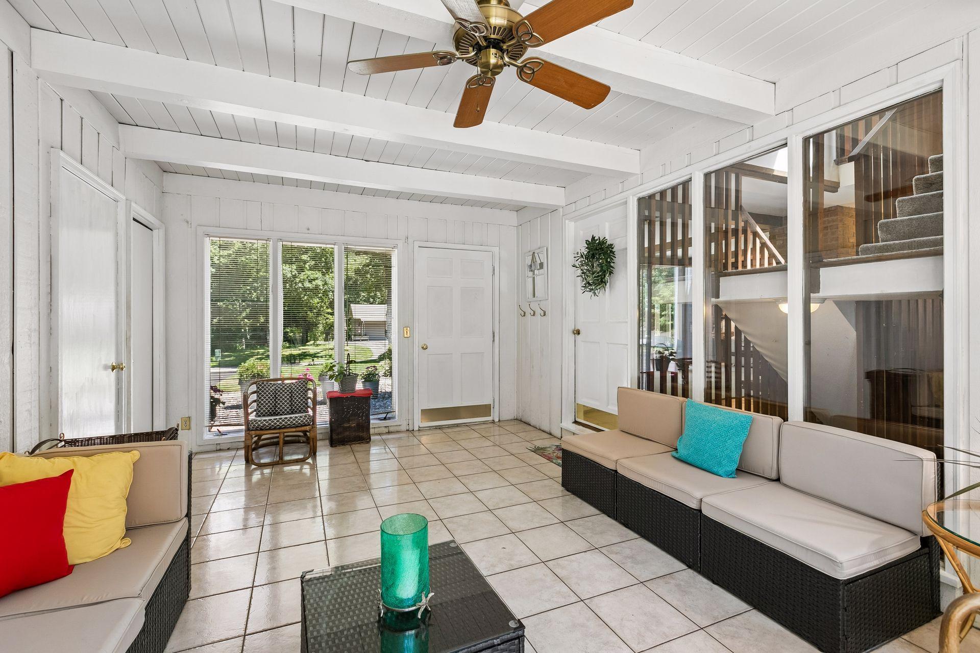 The solarium / sunroom connects the home to the garage and is a wonderful, relaxing space.