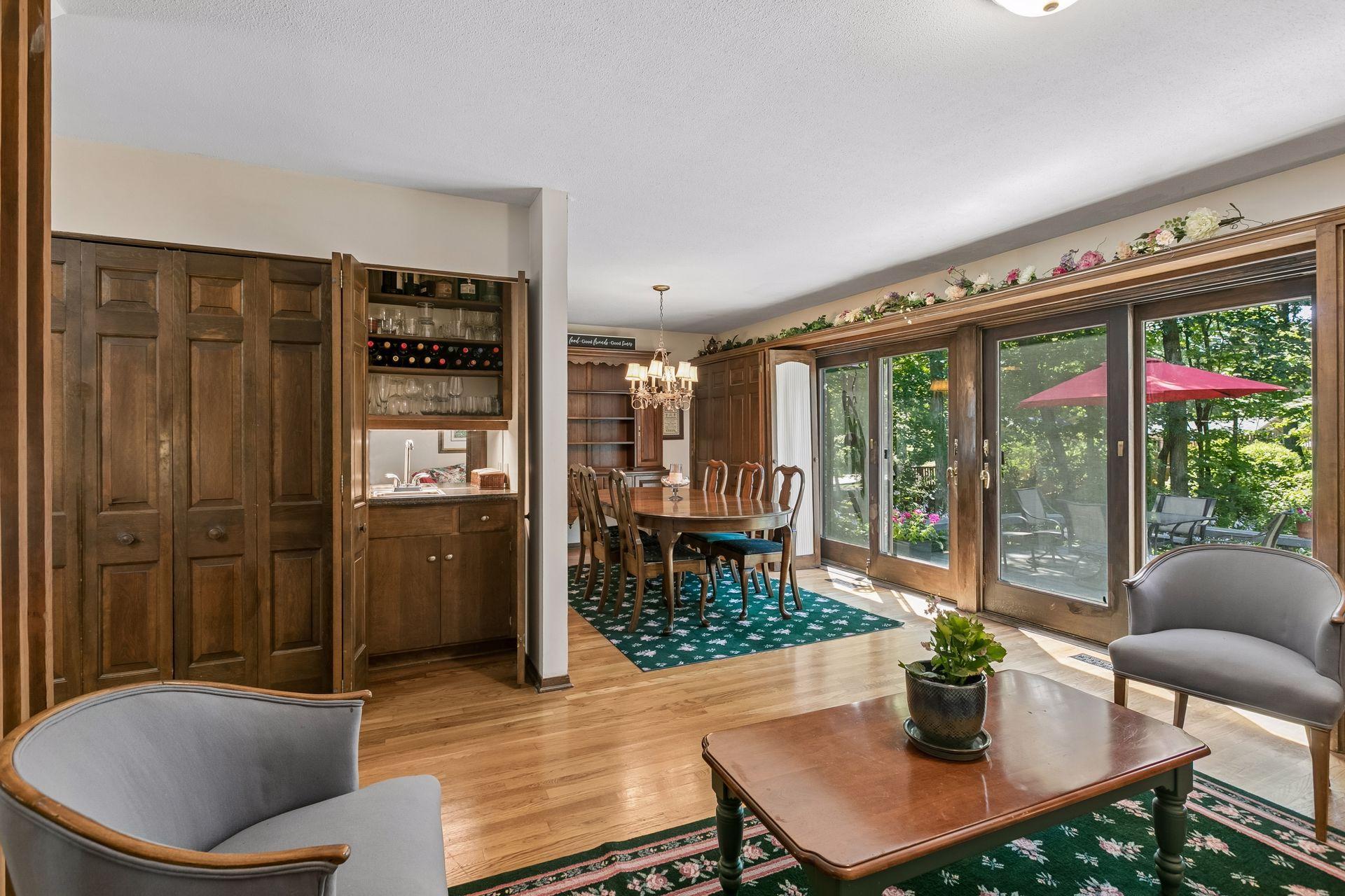 Note the wall of glass overlooking the backyard and deck.