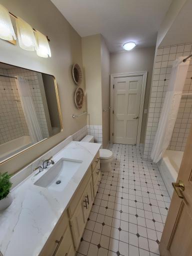 Lower level full bath with separate entrance from pool changing room