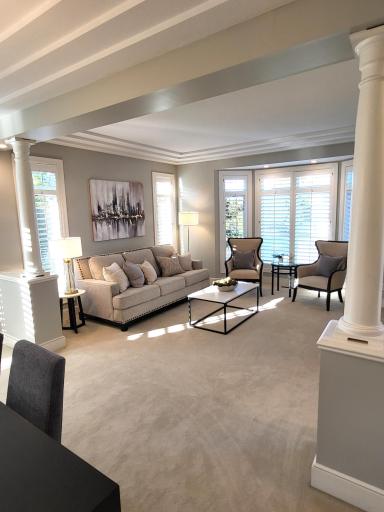 Living room open to dining room for excellent circulation