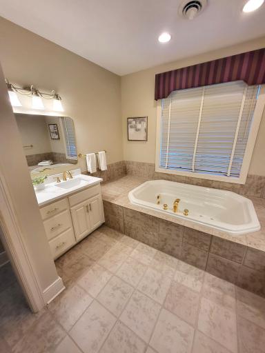 New quartz vanity tops and plumbing fixtures