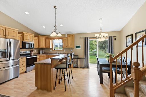Kitchen overlooks the dining and living areas.