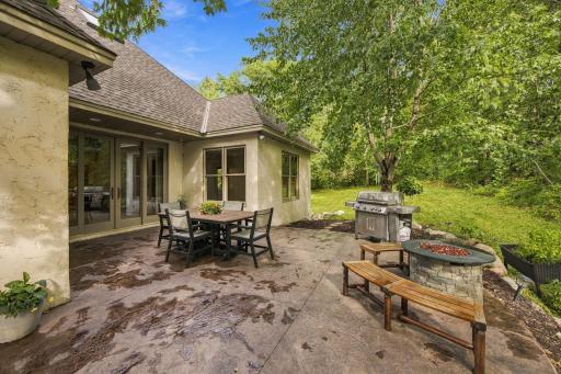 Main-level patio with French doors leading into the family room.