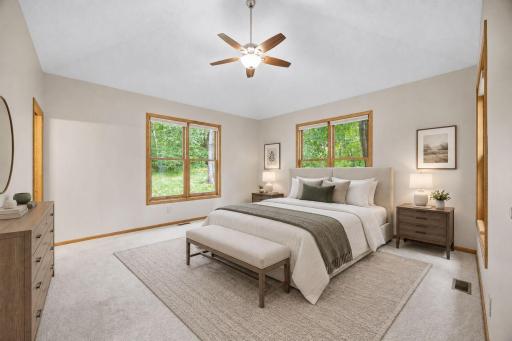 Primary bedroom is on the main level. Virtually staged for inspiration.