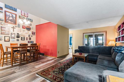 The living room is open to the dining room