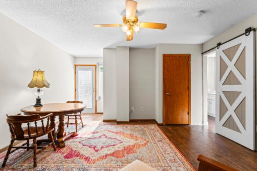 Lots of space in the primary bedroom. Also, notice the sliding barn-style door to the primary bath