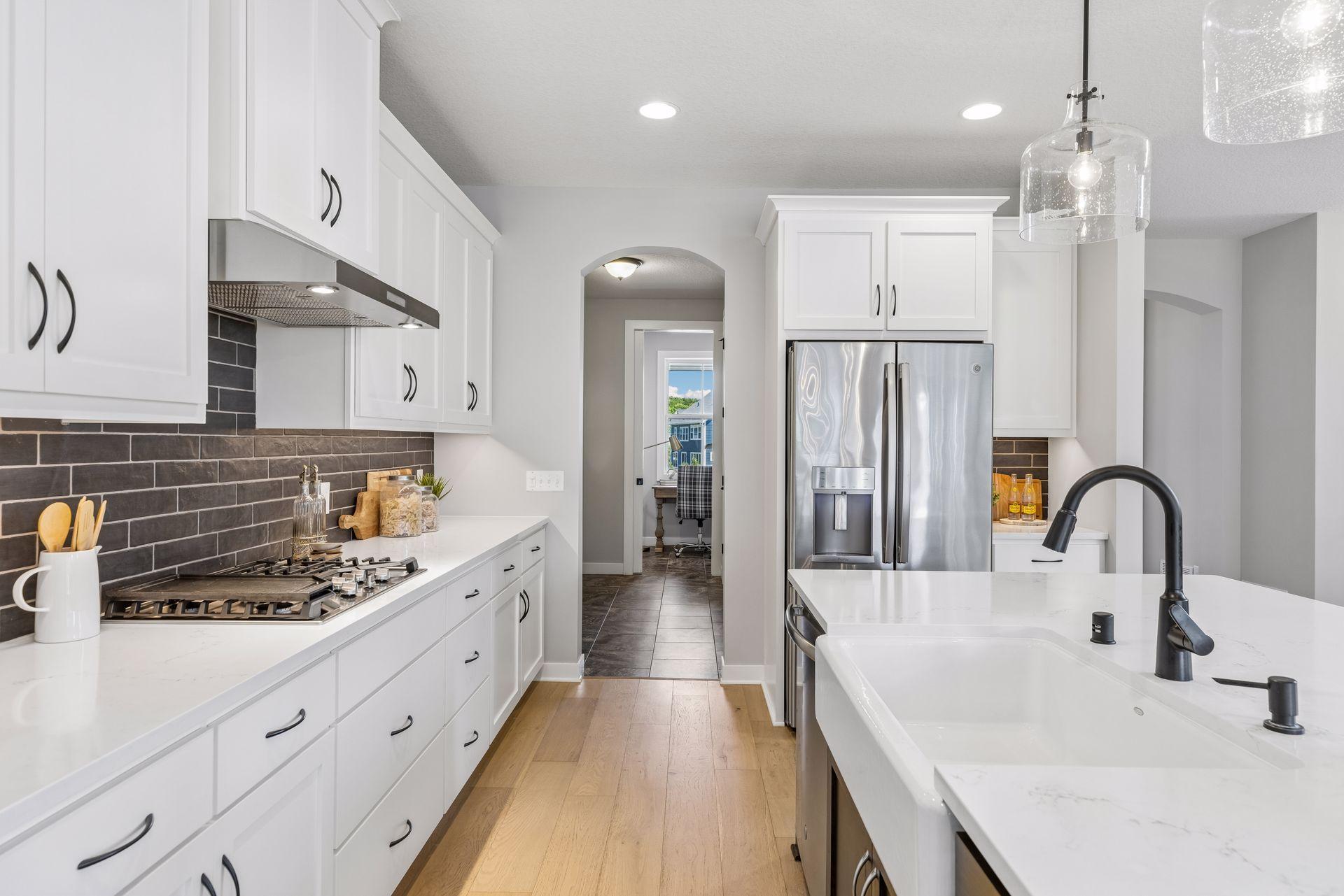 Kitchen includes a large walk in pantry