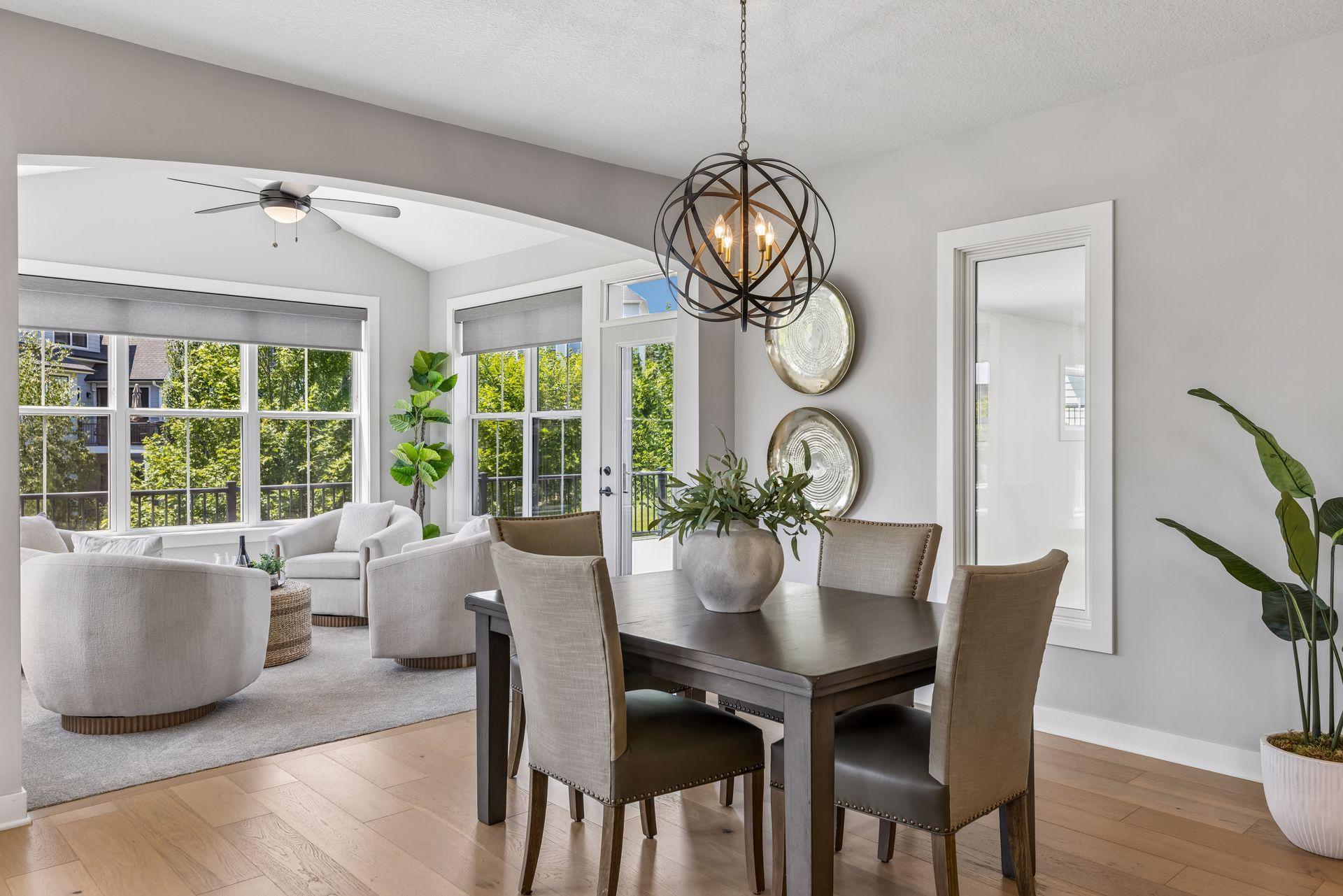 Informal dining on main level, with views to the sport court
