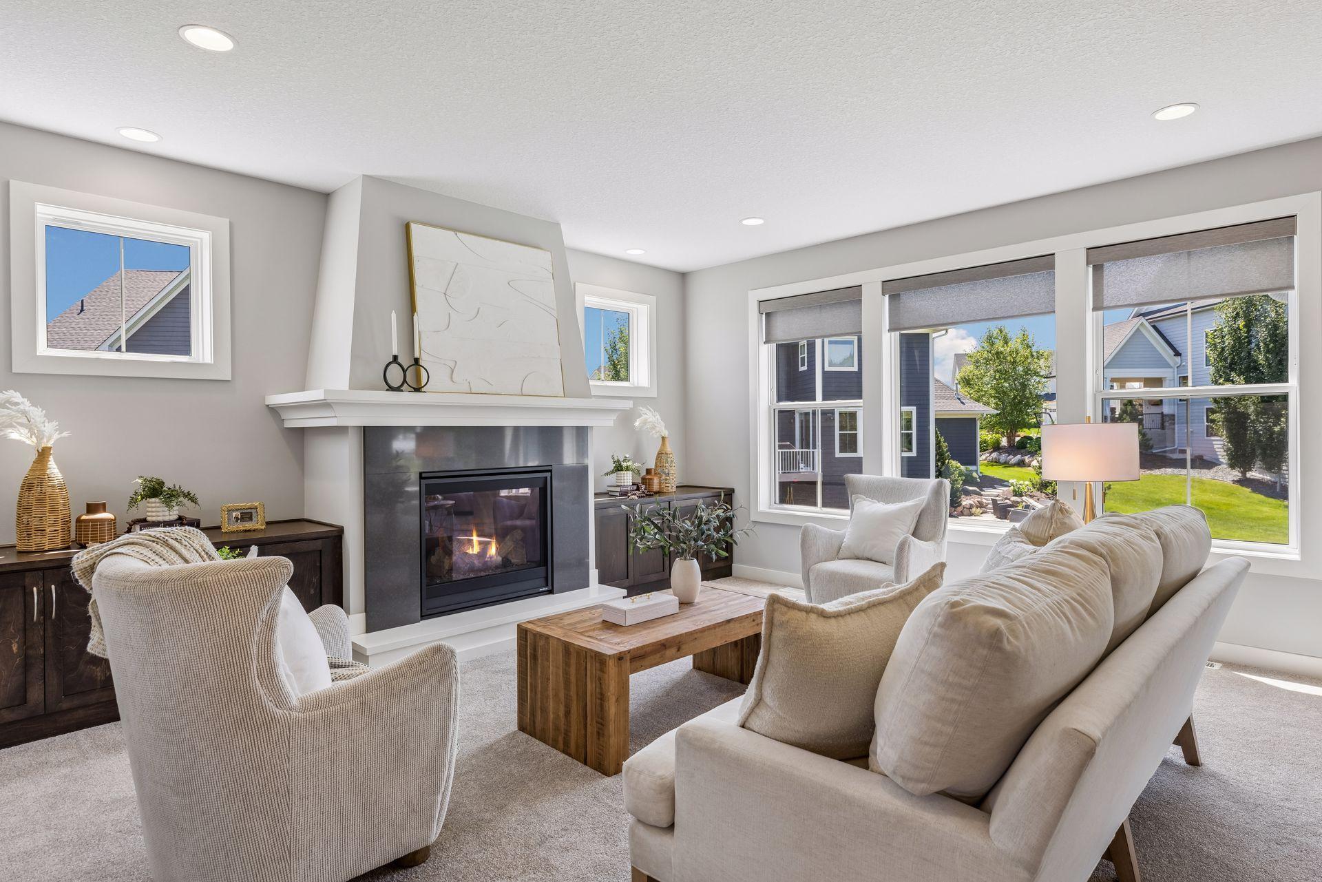 Living room on main level with gas burning fireplace