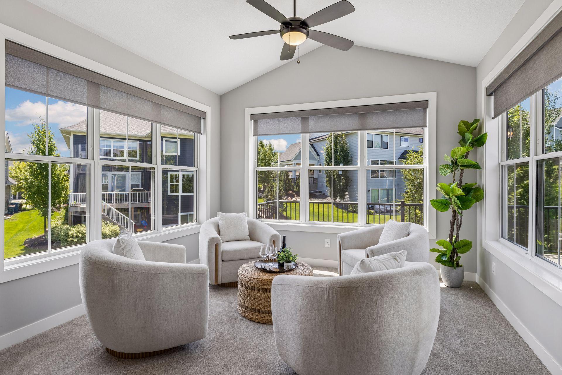 Sunroom on main level, opens to a large maintenance-free deck
