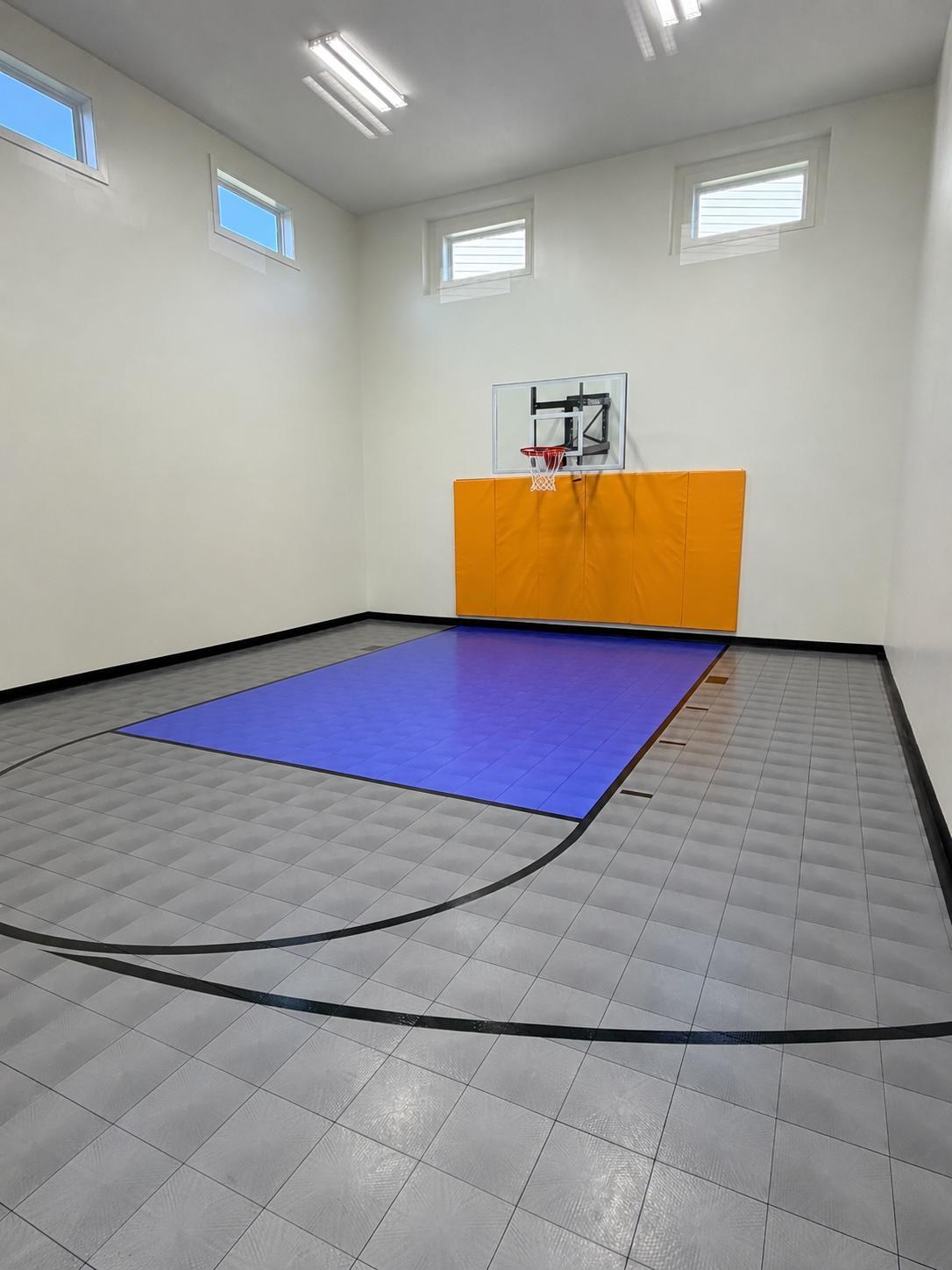 Sports court with hoop, pad & 3 point line