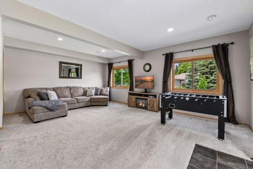 Lower level is filled with big windows and NEW carpet to enjoy.