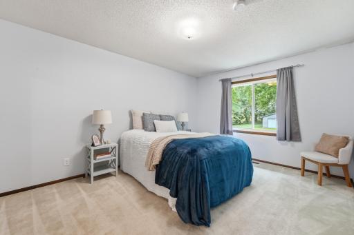 Comfortable primary bedroom offering a peaceful retreat at the end of the day.