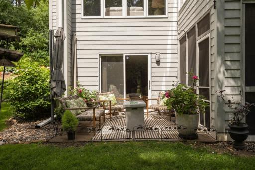 Walkout patio from lower level--in addition to the screened porch.