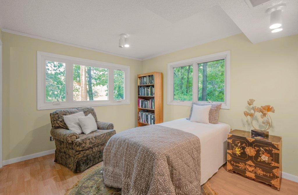 First floor bedroom #3 view has a convenient attached 1/2 bath