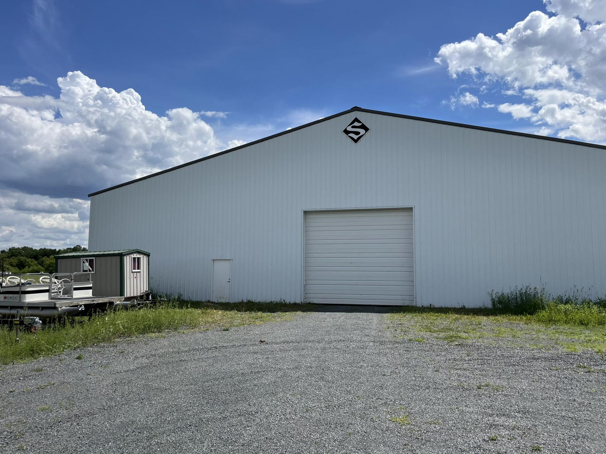 one of the four outbuildings