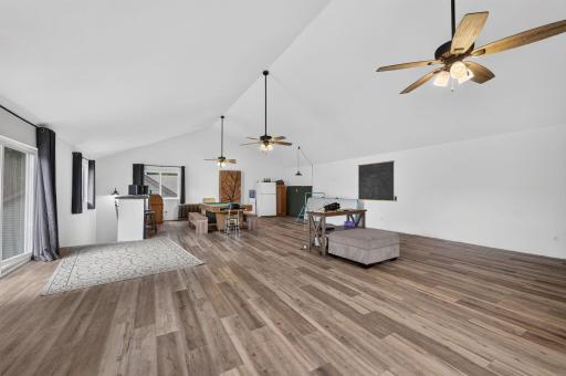 Showstopping bonus room above the garage with vaulted ceilings, abundant natural light, and expansive open space. The perfect spot for hanging out, entertaining, or creating your dream flex space.
