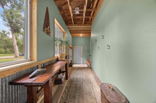 This wonderful breezeway sets this split entry home apart from all the rest.