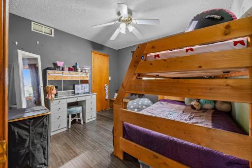 Cute and functional bedroom currently set up as a kidâs room, offering flexible space for sleeping, studying, or play.