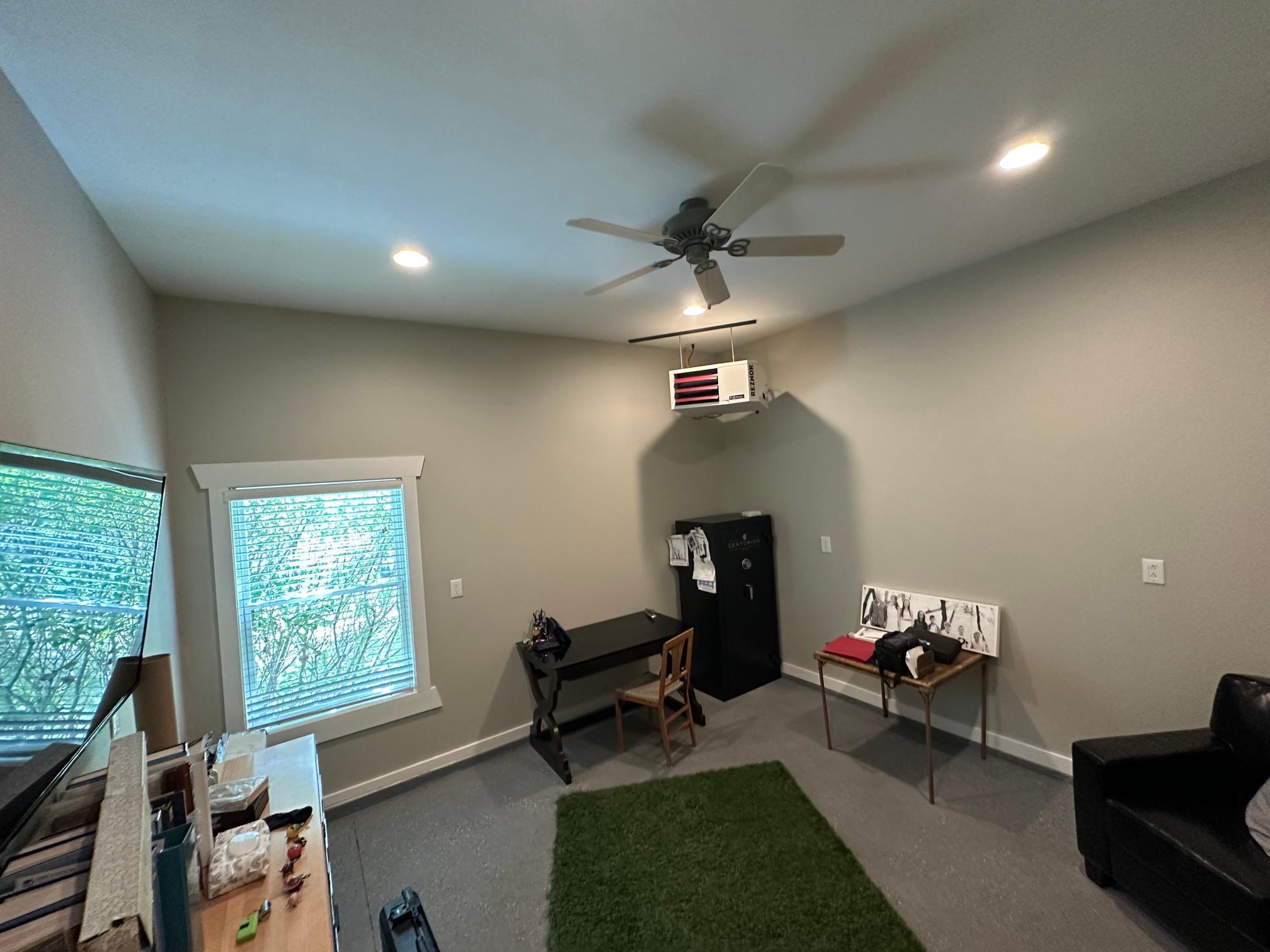 Room in back of extra garage stall
