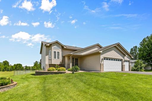 Front with beautiful landscaping