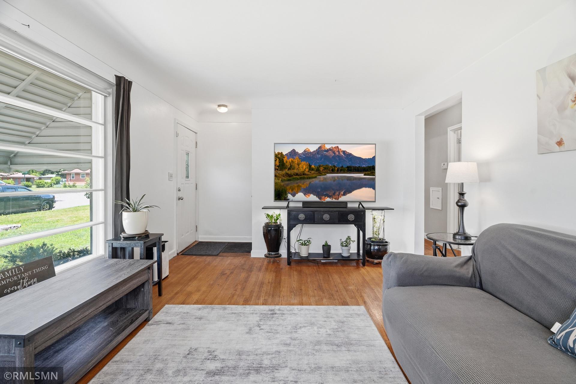 Living room and foyer as you enter the home.