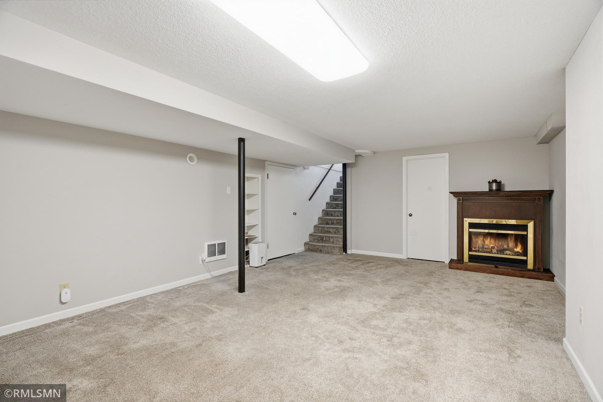 Equipped with an electric fireplace.