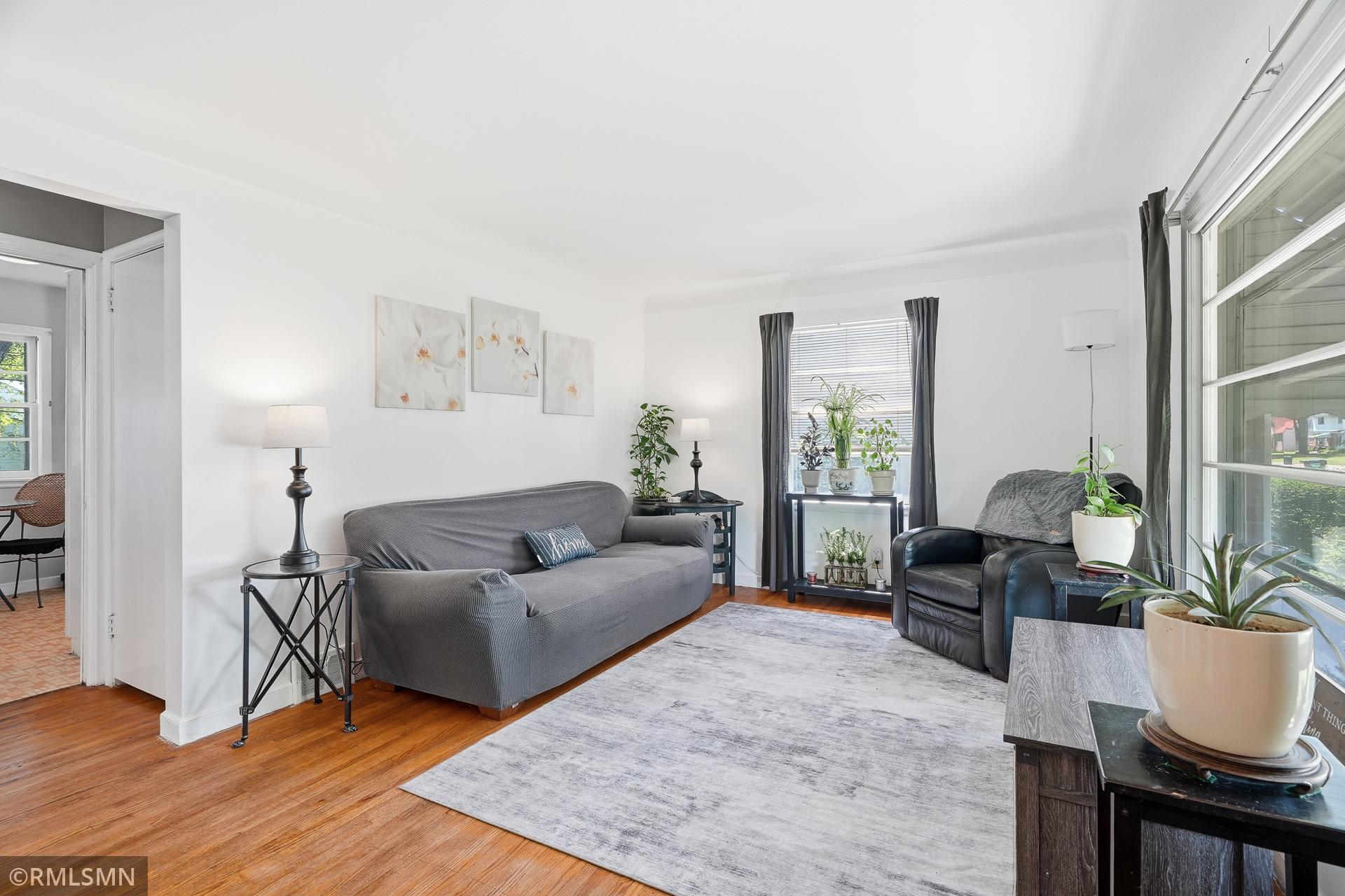 Coved ceilings and hardwood floors for a classic feel.