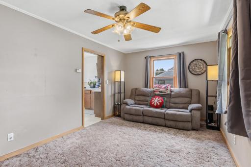 Living Room- Hard wood floors underneath carpet