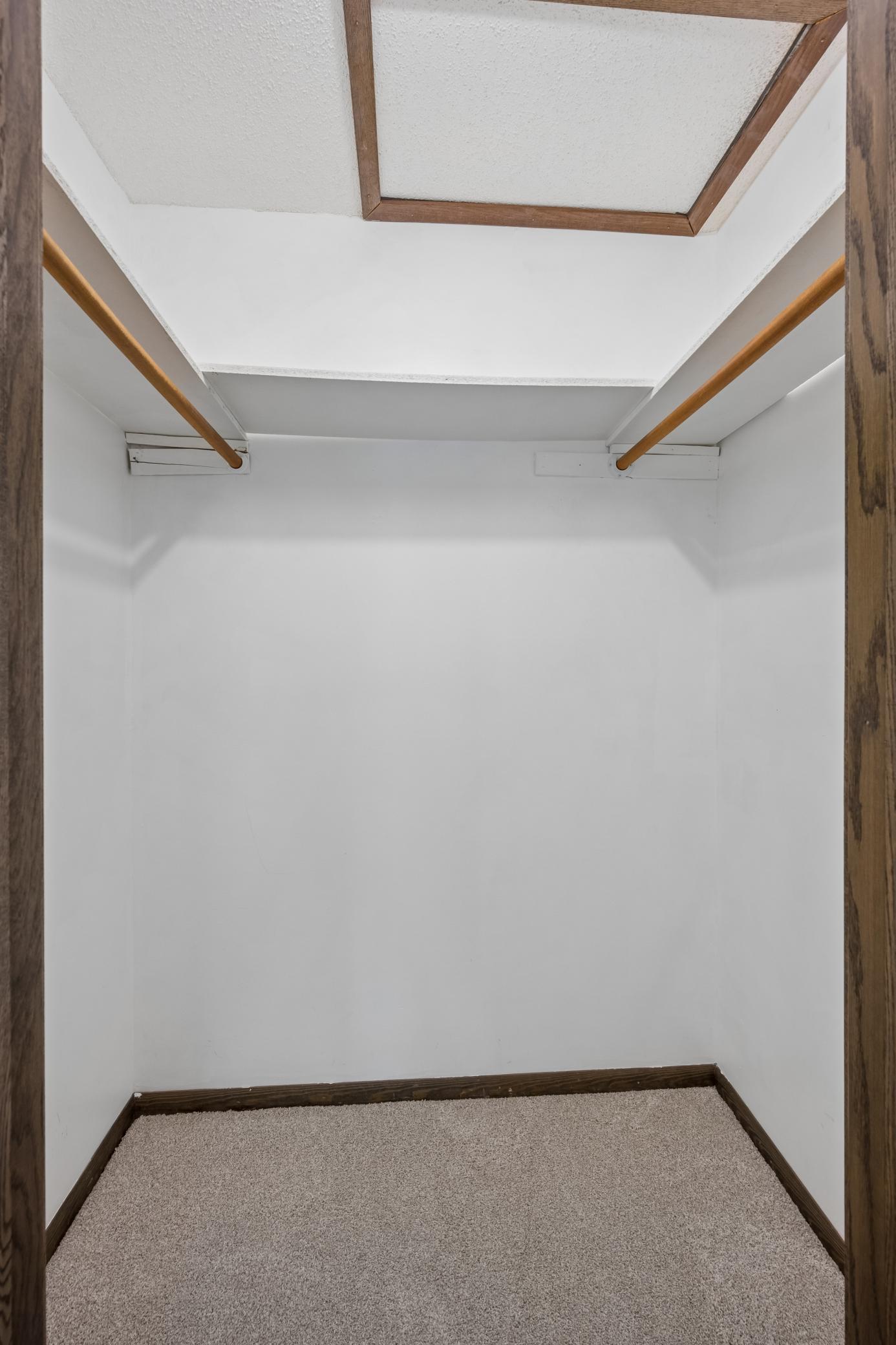 Primary Bedroom Walk-In Closet.