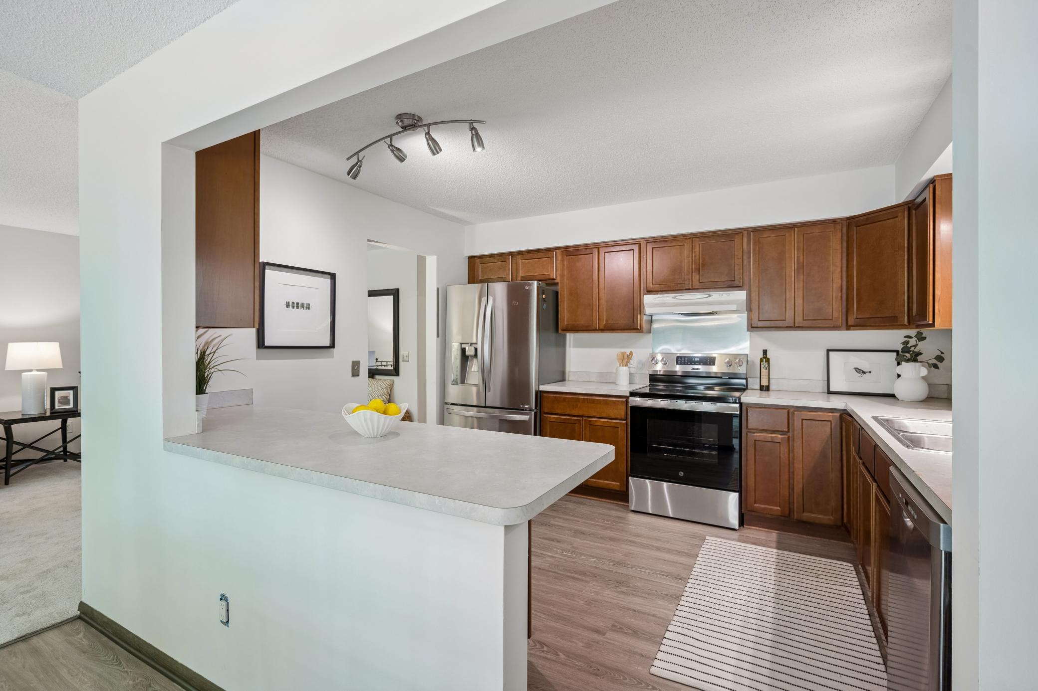 Dining room overlooks into the kitchen, creating a connection between the two spaces.
