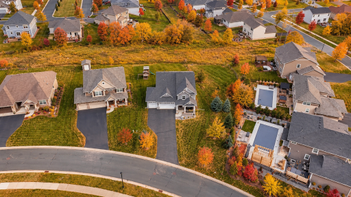 Autumn Aerial View of Suburban Neighborhood.png