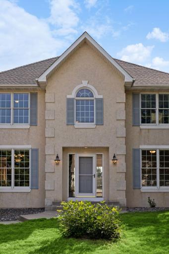 10577 Alamo Street Northeast - Beautiful Frontage with Stucco, Shutters and Window Panels