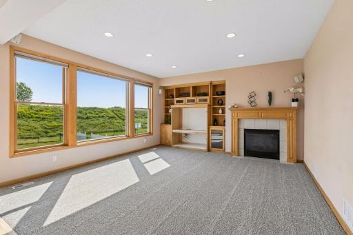 10577 Alamo Street Northeast - Entertainment Center with Decorative Fireplace