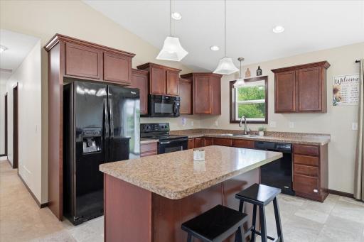 Kitchen island provides great space for meal prep, snack time or entertaining
