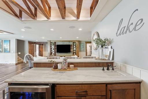 Take the game in from where ever you wish. Enjoy the marble counters and the alcove ceilings with exposed trusses.
