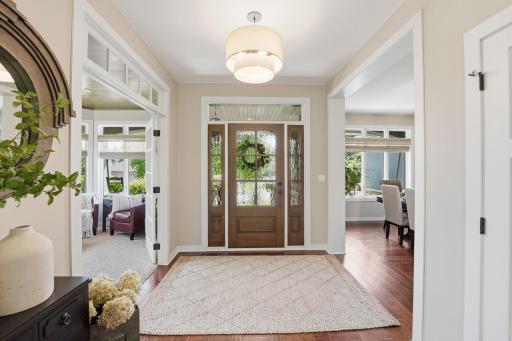 The grand foyer sets the stage for the elegance and comfort found throughout the home.