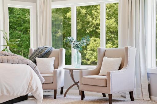 Cozy seating nook offers the perfect place to read, unwind, or enjoy a quiet morning.