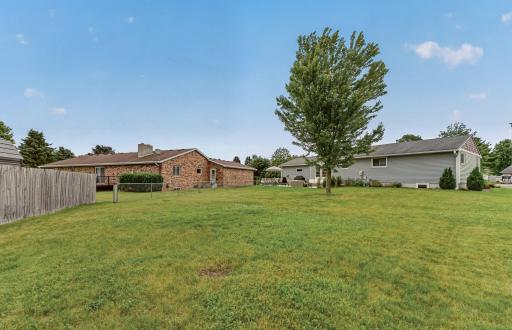 Large and almost fully fenced flat backyard space.