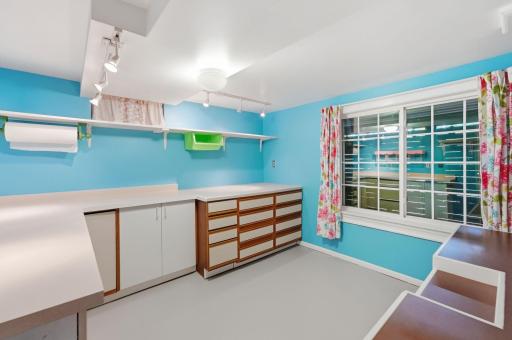 Separate workshop area is ideal for DIY enthusiasts, hobbyists, and makers.