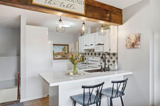 Thoughtfully selected light fixtures complement the home's finishes and dÃ©cor.