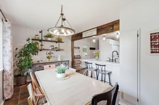 Dining room is adjacent to the kitchen for easy access to meals.