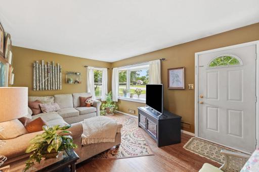 Well lit and inviting front living room.