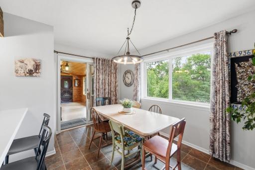 Dining room lends access to the four season sun room.